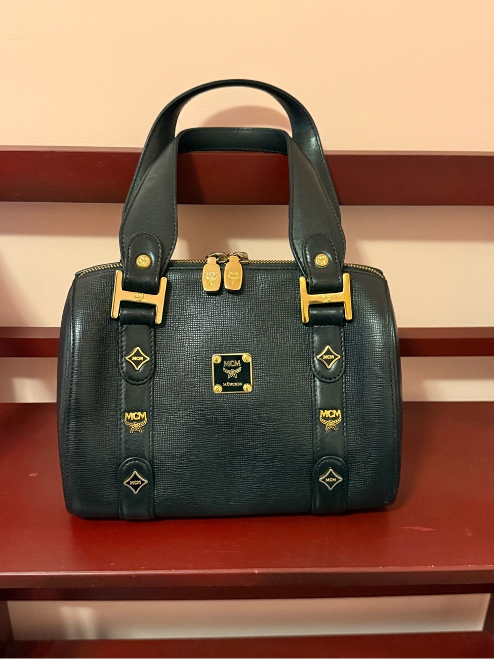 MCM Black Leather Satchel with Gold Hardware Accents